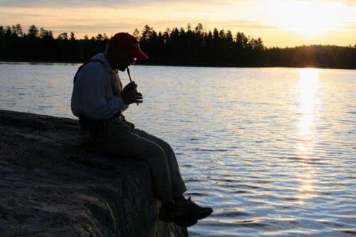 Evening flute recital at Thursday Bay on Crooked Lake; Robin Reilly.